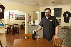 NEW KIDS ON THE BLOCK : Aaron Wharton started Cambria Beer Co. last spring; it was one of five SLO County breweries to open over the past year. - PHOTOS BY STEVE E. MILLER
