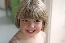 DR. CARMEN AND MS. HYDE : Carmen Joines, age 5, looks sweet but has a violent streak! - PHOTO BY GLEN STARKEY