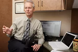 NUMBERS SCHMUMBERS : South County oncologist Dr. David Palchak doesn’t see evidence of a significantly higher cancer rate in SLO County, despite statistics that might indicate otherwise. - PHOTO BY STEVE E. MILLER