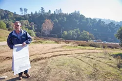 MAPPING DEBATE: Ken Johnston, project manager for the proposed Las Pilitas quarry, said the operation would supply a needed source of rock. Opponents of the project, many who live in the area surrounding the site, don’t buy that. - PHOTO BY KAORI FUNAHASHI
