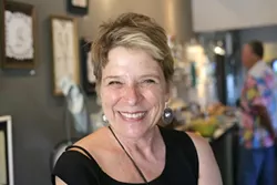 QUIRKY KITTEN : Santa Margarita artist Peg Grady is displaying a series of recycled linens with stitched depictions of items she’s discarded, at Deer Run Art & Artifacts through Sept. 5. - PHOTOS BY GLEN STARKEY