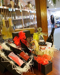 WINE GIFTS GALORE :  Thanks to all the local wine shops, gift givers have a wide choice of items sure to please wine lovers. - PHOTO BY STEVE E. MILLER