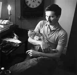 MAN AND BEAST : “He was one of my first crushes,” Tress admits of the young man pictured. The photo was taken in the Bachelor’s Quarters, a boardinghouse for men in San Francisco. - PHOTO BY ARTHUR TRESS