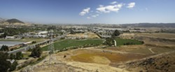 PARADISE SAVED? :  A referendum could prevent Prado Road from bordering the Damon-Garcia sports fields and linking up with Broad Street. - PHOTO BY STEVE E. MILLER