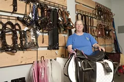 PLETHORA OF LEATHER : At The Tack Room in Paso Robles, Laurie Ridgeway showcases many of her products available for all you cowboys and cowgirls out there. - PHOTO BY STEVE E. MILLER