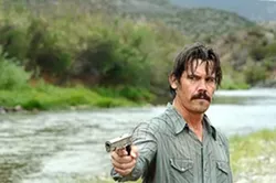 PACKING THE HEAT : On Feb. 24, 2008, No Country for Old Men—in which Brolin starred—won an Academy Award for Best Motion Picture of the Year. - PHOTO COURTESY OF MOVIEWEB.COM