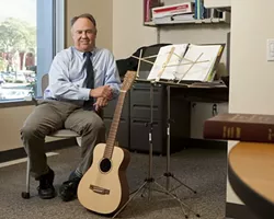 TAX MAN, AXE MAN: Though James P. Erb—the county’s auditor, controller, treasurer, tax collector, and public administrator—may deal with weighty financial issue at his day job, he’s also a Led Zeppelin enthusiast who enjoys playing the guitar when he can find the time. - PHOTO BY STEVE E. MILLER