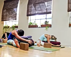 GO WITH THE FLOW: For one of the more entertaining Art Bash articles this year, new Arts Editor Jessica Peña donned an Australian accent during a yoga session themed around menstrual cycles. - PHOTO BY JESSICA PEÑA