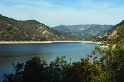LAKES ON THE LOWDOWN: Reservoirs in San Luis Obispo County are facing low capacity levels. Lopez Lake, pictured here, is currently in the best shape, with a 57 percent capacity. Santa Margarita Lake is at 39.2 percent capacity, with Nacimiento at 22 percent and San Antonio at 5 percent. - PHOTO BY STEVE E. MILLER