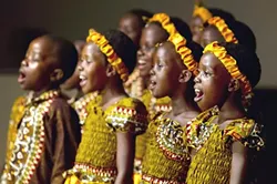EAR-TO-EAR SMILE: On Feb. 3, the Hillside Church of Grover Beach will put a smile on your face with a free concert by The African Children’s Choir. - PHOTO COURTESY OF THE AFRICAN CHILDREN’S CHOIR