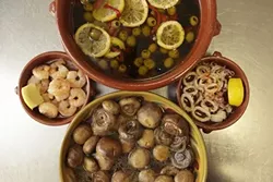 FINE FARE : Try the tapas menu at happy hour for a varied taste treat. - PHOTO BY STEVE E. MILLER
