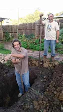 DIGGING THE PIT: Ray Lee (left) and Keith Pellemeier helped dig the roasting pit. - PHOTO BY GEORGE GRIFFIN AND GLEN STARKEY