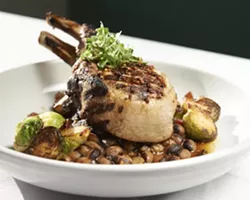 GORGEOUSLY DELICIOUS : Three plates that chefs Jacob Moss and Maegen Loring are particularly proud of are a grilled Salmon Creek Farms double pork chop with spicy black beans, brussel sprouts, and dijon reduction; seared day boat scallops, with spicy tuna, ginger caviar, and a carrot ginger puree; and chocolate stout cake, with pumpkin ice cream and pepita brittle. - PHOTOS BY STEVE E. MILLER