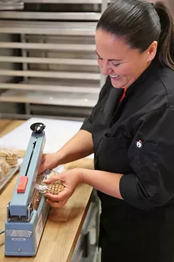THE SWEETEST THING: Annie Farrell is proud chief cook, and bottle washer at Just Baked SLO. - PHOTO BY DYLAN HONEA-BAUMANN