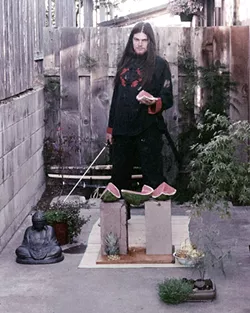 BAD FRUIT : Reiku Hituero chops watermelon with a katana as a performance art piece. - PHOTO COURTESY OF ART ZERO