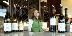 HAPPY WINES :  Maria Stolo Bennetti is the smiling face you&rsquo;ll see behind the counter serving wine tastings. - PHOTOS BY STEVE E. MILLER
