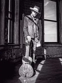 ROAD WARRIOR: Joshua Kloyda brings his acoustic blues sounds to Old Cayucos Tavern on Aug. 26. - PHOTO COURTESY OF JOSHUA KLOYDA