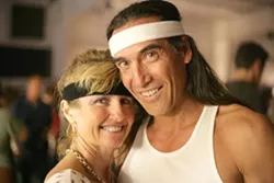 HEADBANDS! : Kyle (left) and Francis, two members of the local Beliza Sol Mardi Gras krewe, rock the headbands! - PHOTO BY GLEN STARKEY