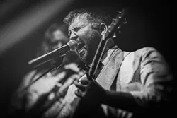 SHINER: Dan Curcio, frontman for Moonshiner Collective, plays what may be their last SLO Brew show on Nov. 15. - PHOTO BY MARK GVAZDINSKAS
