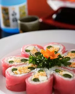 HEAVENLY : The new fall menu at Sushiya offers a fabulous juxtaposition of textures and flavors, such as the cherry blossom roll, which contains crab, asparagus, and cilantro, wrapped with tuna. - PHOTO BY STEVE E. MILLER