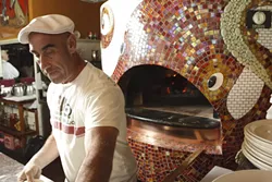 OCTOPUS MAN : Giuseppe DiFronzo’s boundless creativity extends to the new oven he designed to prepare his exquisite Italian fare. - PHOTO BY STEVE E. MILLER