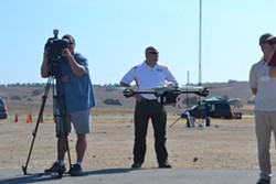 DRONE DEMO:  The InstantEye drone, manufactured by Boston-area tech company Physical Sciences Inc., hovers at Camp Roberts&rsquo; McMillan airfield during a Joint Interagency Field Exploration (JIFX) event. - PHOTO BY RHYS HEYDEN