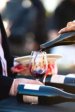 THE REAL KEY TO HAPPINESS?: SLO County residents are blessed with two major wine regions, which Sunset magazine calls “escapes.” - PHOTO BY KAORI FUNAHASHI