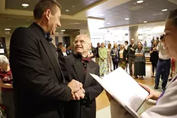 AT LAST: On June 16, 2008, Gerald Lindemulder and David Robinson were the first gay men in SLO County to be legally married. Since then, the state’s gone and back and forth on the legality of same-sex marriages. A recent U.S. Supreme Court decision solidifies them as legal across the country. - FILE PHOTO BY STEVE E. MILLER