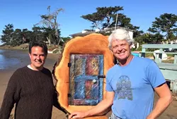 CLIMATE FEST: Baywood residents Paul Irving (left) and Ted Emrick (right) stand next to one of Emrick’s environmentally inspired sculptures. - PHOTO BY PETER JOHNSON