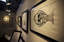 SOMETHING FISHY: Joseph Kalionzes taught himself printmaking techniques, and his works are pulled from hand-carved linoleum and wood blocks. - PHOTO BY KAORI FUNAHASHI