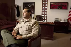 ‘I WANT THE RESPONSIBILITY’ : San Luis Obispo County Sheriff Ian Parkinson speaks of reestablishing regional anti-gang and narcotics units—which he hopes will eventually include participation from each local law enforcement agency—to fill the void left by a state in financial crisis. - PHOTO BY STEVE E. MILLER