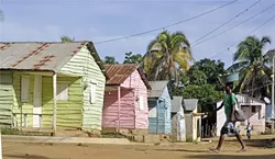 BARRIO SUR: The Waves of Health medical nonprofit visits this impoverished neighborhood in the Dominican Republic border city of Dajabòn twice a year. A border crossing into Haiti is less than a five-minute walk away. Waves also set up clinics in Bahia, Aviacione, and Sabana Larga during the first week of November 2015. - PHOTO BY CAMILLIA LANHAM