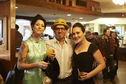 HIPSTER CITY : My Pal Mick Souza finds himself sandwiched between (I hope I have these names right, ladies) Jill (left) and Deidra. - PHOTOS BY STEVE E. MILLER