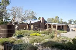 HONORING THY NEIGHBOR?: Since it opened nearly four years ago, the Clubhouse at This Old House on the outskirts of San Luis Obispo has been the focus of noise complaints from its rural neighbors. - PHOTO BY STEVE E. MILLER