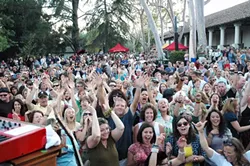 JOIN THE SHINY HAPPY PEOPLE! : Crowds of more than 2,000 people frequently gather to dance and buy five-dollar beers. - PHOTO COURTESY OF NADA RASTA