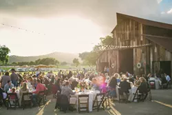 RAISING THE BARN: The barn and ranch houses of Greengate Ranch and Vineyards play up the subtle rustic elegance of the Central Coast. - PHOTO BY CAMERON INGALLS