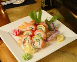 DELICIOUS SEA TREATS : A sampling of different plates from Off the Hook Sushi Bar and Grill includes the Alaskan king roll (salmon, asparagus, crab, and avocado), Morro Bay red snapper and chips, and oven-roasted Morro Bay red snapper with a seafood mussel risotto. - PHOTO BY STEVE E. MILLER