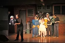 OUT REPUBLICAN, CLOSETED HOMOSEXUAL : Ultra-conservative Rod (Michael Rogers, left), afraid to confront his obvious gayness, spins a fantastic lie about his fictional girlfriend in Canada, much to the chagrin of his friends from Avenue Q (everyone else, right). - PHOTO BY DANIELLE DUTRO PHOTOGRAPHY