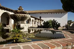 QUAFF FOR THE QUAKE : Santa Miguel vintners and their neighbors are raising funds to restore Mission San Miguel, which still needs some final retrofitting to repair damage from the 2003 San Simeon quake. - PHOTO BY STEVE E. MILLERE