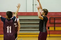 SCORING POINTS : Daniel Oliver sinks a basket in a mock game with his team mates.
