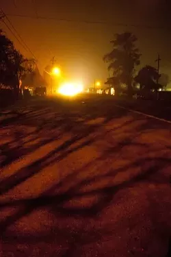 CLEANED OUT: After the SLO Police Department threatened that they would tow vehicles on Prado Road, nearly everyone cleared out of the street on the night of Feb. 17. David Eves, pictured above, said police told him to go to Prado in the first place. - PHOTOS BY STEVE E. MILLER