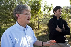 FOOD NETWORK : Cal Poly Organic Farm’s retired faculty adviser John Phillips (left) and sustainable agriculture proponent Terry Hooker (right) miss the connections between the community and the farmers created by the farm’s vegetable-subscription program. - PHOTO BY STEVE E. MILLER