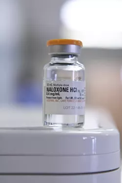 REVIVER: Naloxone—commonly known as Narcan—is administered to victims of heroin overdose to counteract the drug’s effect on the brain. The patient will come to within seconds, said one emergency technician. - PHOTO BY STEVE E. MILLER