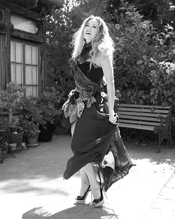 PRETTY AS A PEACOCK : Silk marbler Sharon Gellerman and veteran seamstress Bernadene Morgan teamed up to create this vibrant fantasy gown, inspired by the ostentatious coloring and plumage of the peacock. Pictured is model Amanda Valena. - PHOTO BY STEVE E. MILLER