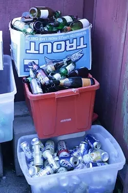 LOOKS LIKE ABOUT 20 BUCKS : The recycling was piled high after the party. - PHOTO BY GLEN STARKEY
