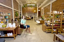 DESIGNING SLO : Carla Wingett, manager of Atmodsphere, offers quality home products. - PHOTO BY STEVE E. MILLER