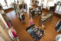 LOOKING GOOD: Ambiance, the women’s clothing and accessory store, has expanded to a second location in downtown Paso Robles. Manager Camilla Burns (left) and Naomi Hanson will be there to help you look your best. - PHOTO BY STEVE E. MILLER