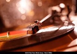 CURVACEOUS : Records are the appetizer, main course and dessert at “Vinyl in the Woods.” - PHOTO BY STEVE E. MILLER