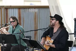 SUPERSTARS IN OUR MIDST : Emmy-winning composer and multi-instrumentalist Danny Pelfrey (left) and Steve Miller Band member Kenny Lee Lewis do justice to Van Morrison’s “Moondance” at a Hospice fundraiser at Sustenance. - PHOTO BY GLEN STARKEY