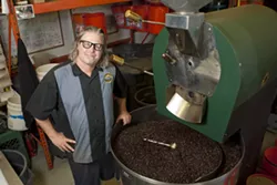 LOCAL ROAST: Phil Grant, Roastmaster for Coastal Peaks Coffee, roasts coffee with knowledge and pride for customers all over the Central Coast. - PHOTO BY STEVE E. MILLER
